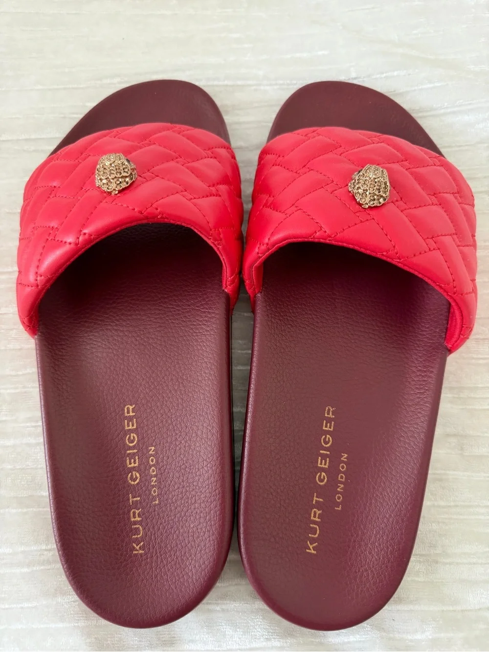 Kurt Geiger Quilted Red Slide Sandals with Gold Emblem